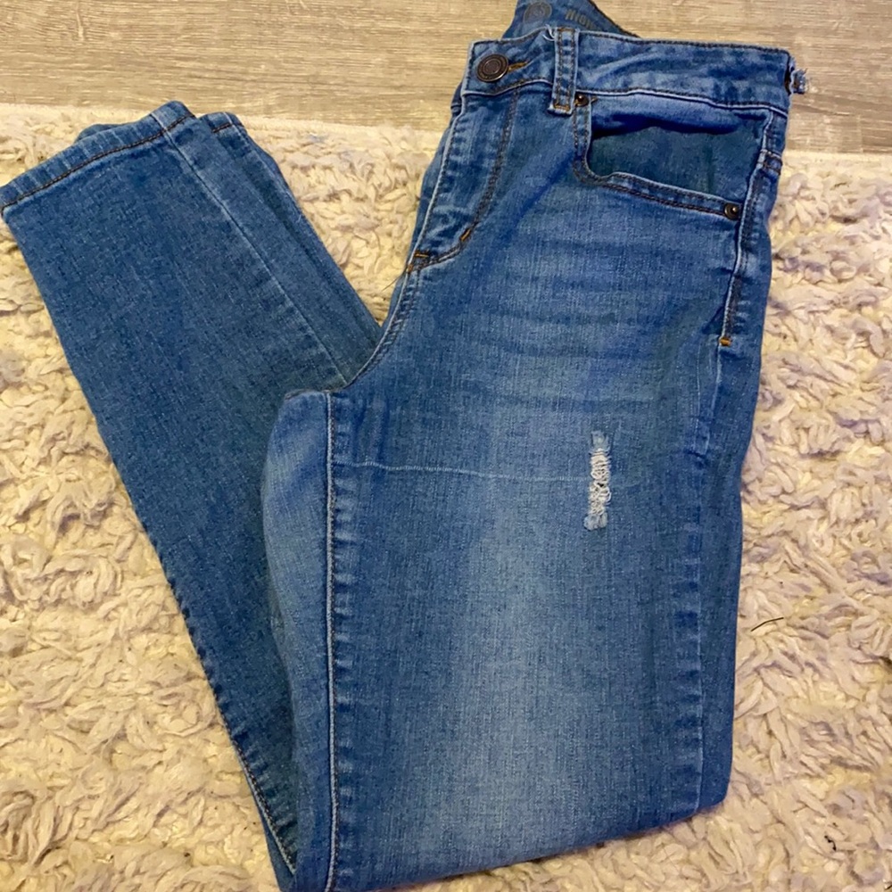 medium washed jeans with little rips